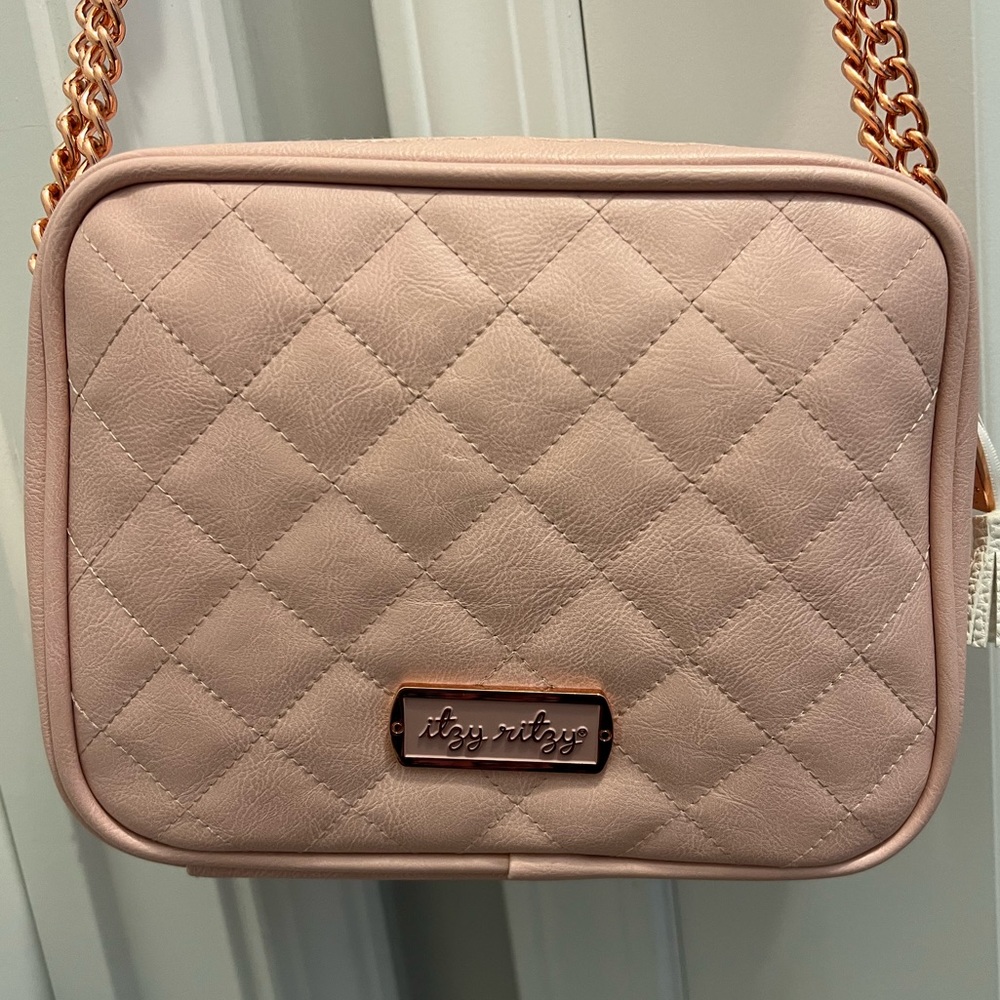 Itzy Ritzy diaper bag purse in pink!! No longer sold. Like new condition.